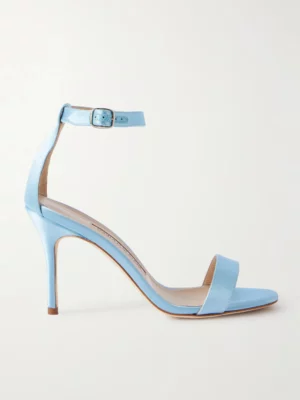 A single light blue Manolo Blahnik Chaos 90 Satin Sandal with an ankle strap and buckle, open toe, and slim stiletto heel, displayed on a white background.