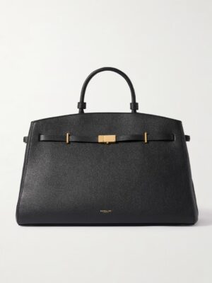 A black leather handbag with gold-tone hardware, structured top handles, and a rectangular clasp closure, reminiscent of the DeMellier The Miami Gathered Leather Tote. “WELTER SHELTER” is embossed in gold near the bottom center of the bag.