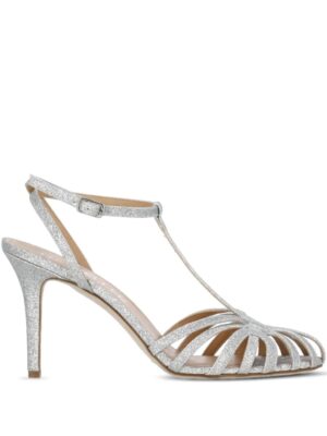 A silver glittery high-heeled sandal with a T-strap, multiple toe straps, an ankle strap with buckle, and a closed heel—The Seller 100mm Ankle-Strap Stiletto Sandals—displayed against a plain white background.