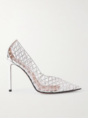 A high-heeled, pointed-toe shoe with a stiletto heel, inspired by the elegance of Aquazzura Memoire Crystal-Embellished Grosgrain Sandals, features a transparent mesh upper with a metallic silver grid and reflective accents.