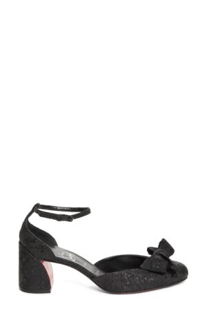 A black women's dress shoe with a closed toe, low chunky heel, ankle strap, and decorative bow on the front, inspired by the elegance of Christian Louboutin 100mm Pink Z Leather Slingback Heeled Sandals, featuring a subtle textured finish.