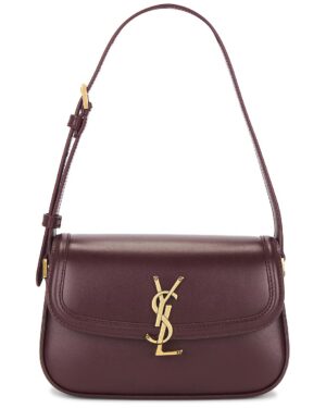 A burgundy leather Saint Laurent Large Solferino Bag with a gold YSL logo on the front flap. The bag features a single adjustable strap and boasts a structured, rectangular silhouette.