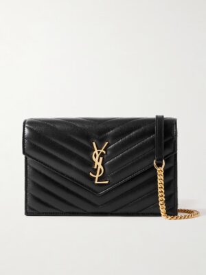 A black quilted leather clutch bag with a chevron pattern, inspired by the Saint Laurent Jamie Cassandre Large Suede Shoulder Bag, features a gold YSL logo on the front flap and a gold chain strap, displayed against a plain light background.