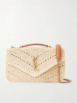 A rectangular woven beige handbag with a gold YSL logo on the front flap, inspired by the Saint Laurent Loulou Quilted Leather Shoulder Bag, featuring a brown leather top handle and a gold chain shoulder strap.
