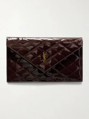 A rectangular, dark burgundy Saint Laurent Paris Matelasse Patent-leather Clutch with a quilted pattern, an envelope-style flap, and a gold YSL logo in the center. The bag is displayed against a plain white background.